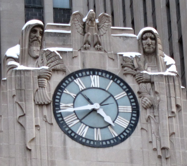 Snowcapped figures on the Chicago Board of Trade Buildling, © 2013 Celia Her City