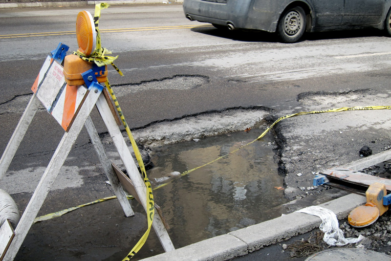 Chicago potholes look more like craters these days.