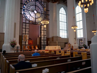 The "unfinished" interior of St Mark's, embellished with its steel screen and rose window.